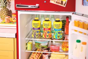 Three types of Cafe Bustello espresso style coffee in a refrigerator.