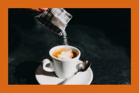 Sweetener being poured into an espresso cup.