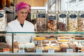 Chef Cristina Bowerman at a food stall at Mercato di Testaccio in Rome