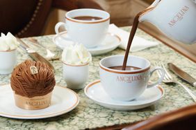 Cup of hot chocolate being poured