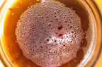 Overhead closeup of beer in a glass