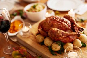 A Thanksgiving spread accompanied by red wine